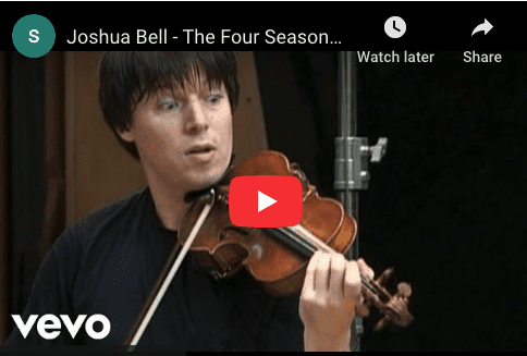 Violinist playing in a music video.
